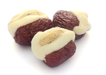 Macadamia nuts isolated on white background - stock photo

