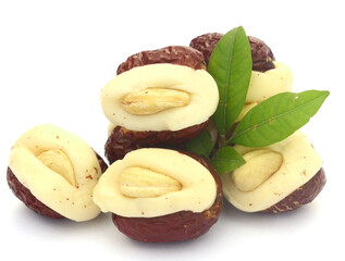 Macadamia nuts isolated on white background - stock photo

