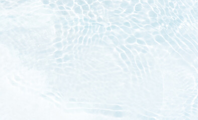 Blue water with ripples on the surface. Defocus blurred transparent blue colored clear calm water...