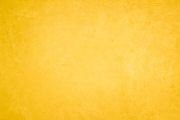 Yellow concrete stone texture for background in summer wallpaper. Cement and sand wall of tone vintage minimal. Concrete abstract wall of light yellow color, cement texture white blank for home decor.