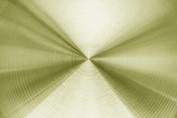Golden circular brushed shiny metal texture. Abstract metallic background.
