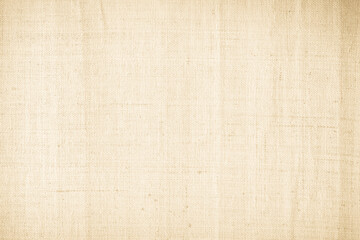 Jute hessian sackcloth canvas woven texture pattern background in light beige cream brown color blank empty.