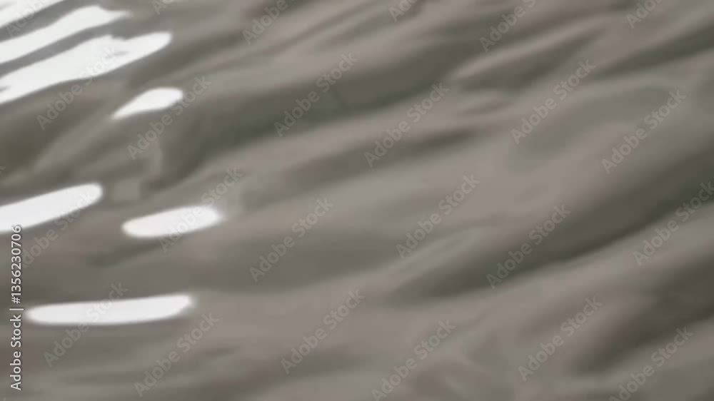 Poster dynamic flow of reflective liquid waves creating hypnotic patterns in motion