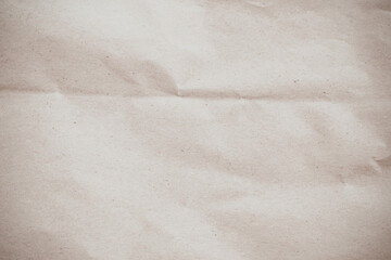 Old paper vintage texture surface for background. Recycle pale brown paper crumpled texture, Cream color recycled kraft paper texture blank with copy space for text.