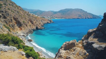 Secluded turquoise cove nestled between rugged cliffs in Crete Greece