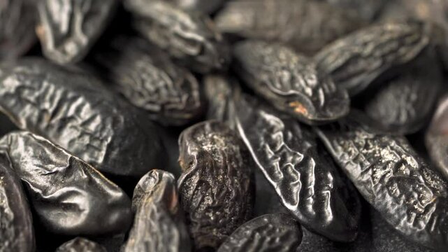 closeup pile of tonka bean rotation food background footage 4k