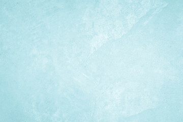 Pastel blue and white concrete stone texture for background in summer wallpaper. Cement and sand wall of tone vintage. Concrete abstract wall of light cyan color, cement texture mint green for design.