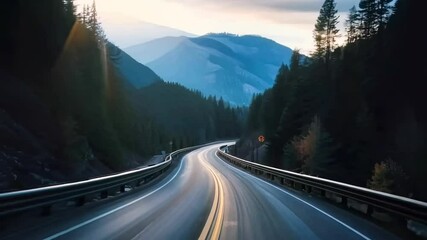 Aerial video captures a winding mountain road at sunset, surrounded by dense forests and distant hills, creating a serene and adventurous vibe. Live desktop wallpaper.