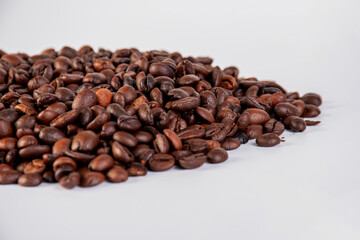 Coffee beans close up isolated on white