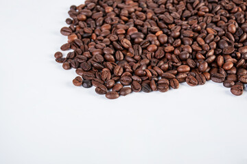 Coffee beans close up isolated on white