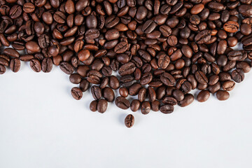 Coffee beans close up isolated on white