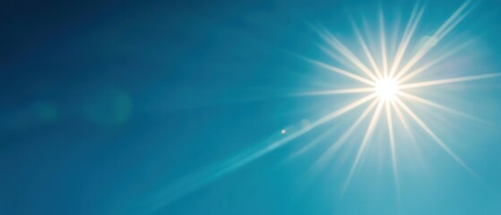 Bright sun rays shining against a clear blue sky, summer vibes, outdoor relaxation, sunshine therapy, nature beauty, perfect for vacation and travel themes.