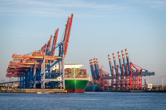 Container terminal Burchardkai in Hamburg, Germany with cranes and cargo ships