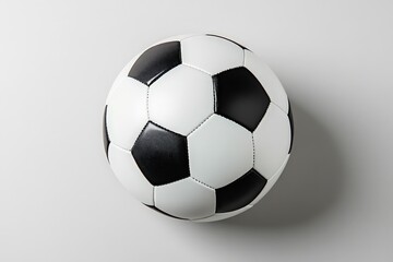 Fototapeta premium A spherical football featuring black and white pentagonal panels