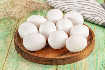 Raw white uncooked chicken eggs