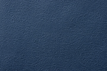 濃い青色の和紙の背景テクスチャー　Navy blue Japanese washi paper  background texture © Nishihama
