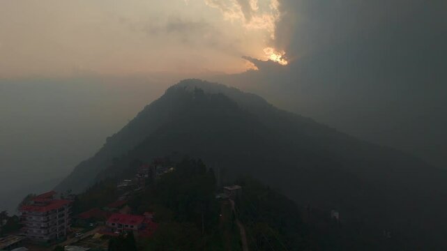 Aerial, drone shot 4k. Aerial view of the foggy day in Pelling, Sikkim. Northern India. Indian Mountain. D Log. Bird eye View. Travelling Northeast Video. Indian mountain village. IN front of Skywalk.