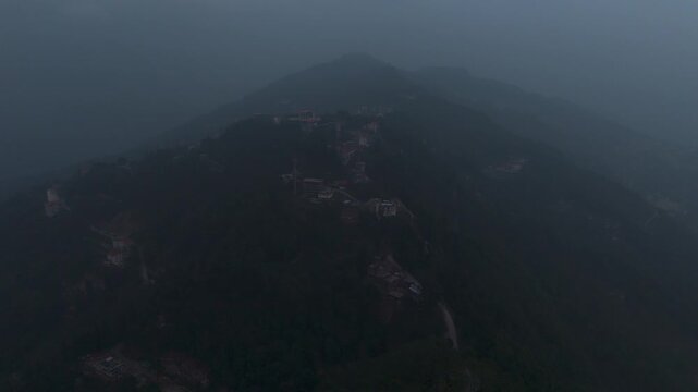 Aerial, drone shot 4k. Aerial view of the foggy day in Pelling, Sikkim. Northern India. Indian Mountain. D Log. Bird eye View. Travelling Northeast Video. Indian mountain village. IN front of Skywalk.