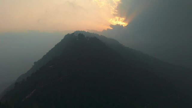 Aerial, drone shot 4k. Aerial view of the foggy day in Pelling, Sikkim. Northern India. Indian Mountain. D Log. Bird eye View. Travelling Northeast Video. Indian mountain village. Sunset