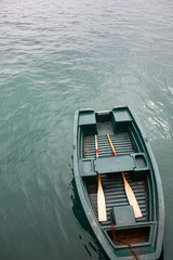 Obraz premium Only the oars remain in the boat