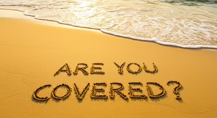 Fototapeta premium The question are you covered is written in the sand