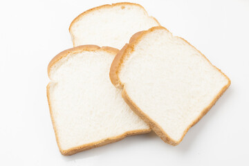   Sliced ​​bread is a staple food made by mixing yeast into flour and kneading the dough, then baking it.
  