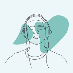 Man enjoying music with headphones against a minimalist background  