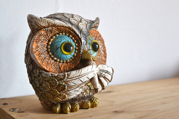 Figura de búho de la suerte
