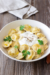 Homemade Russian dumplings. Pelmeni. Traditional Russian Food.