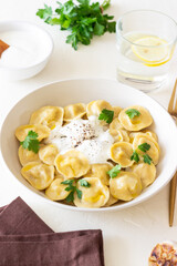 Homemade Russian dumplings. Pelmeni. Traditional Russian Food.