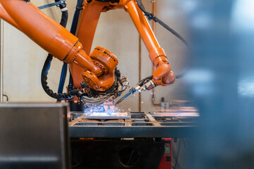 Automatic robotic arms welding in industrial factory