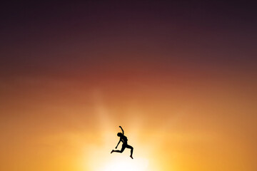 Fototapeta premium Cheerful woman leaps on the air