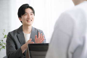 Business image of men and meetings with young job seekers who receive job change and career...