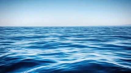 Fototapeta premium Tranquil Ocean Horizon with Endless Blue Waters and Gentle Waves, Serene Nature Landscape with Open Land Expanse, Capturing Peaceful Beauty and Depth Perspective