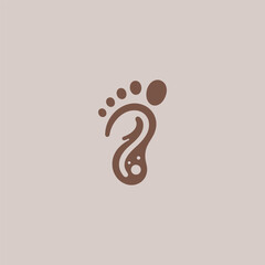 Footprint Logo – A simple footprint logo symbolizing journey, exploration, and progress.