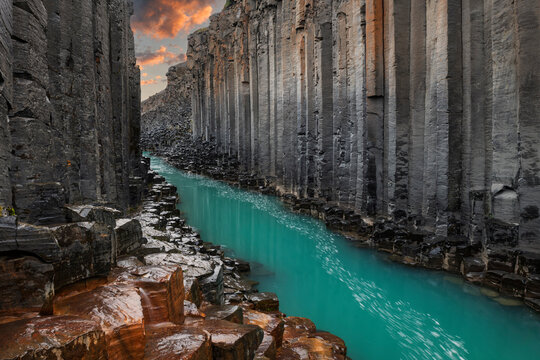 Scenic view of Studlagil Canyon with turquoise J�kla River in Iceland