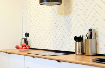 apples in a plate in the kitchen