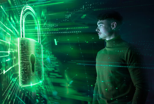 Young man interacting with a holographic lock in augmented reality