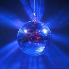 Obraz premium Sparkling disco ball casting vibrant blue light rays in a dark room creating a festive atmosphere for dancing and celebration