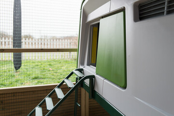 Detail of a large, purpose-built bantam and chicken coup seen in a large, wooden framed poultry...