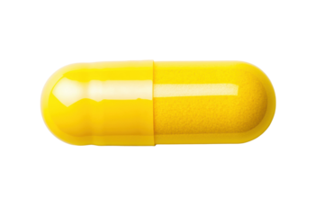Yellow capsule pill isolated on black background, cut out