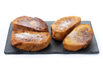 Traditional Spanish torrijas for Holy Week isolated on white background