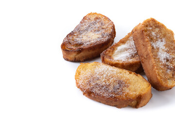 Traditional Spanish torrijas for Holy Week isolated on white background. Copy space