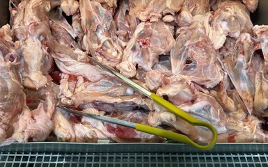 Close up of raw chicken meat in butchera in the market.