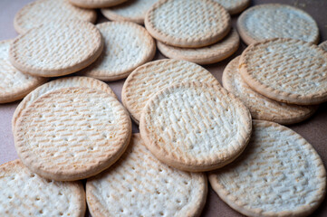 Hard biscuits lie on food paper