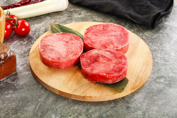 Delicous raw tuna medallion for cooking