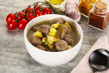 Soup with meatball and potato