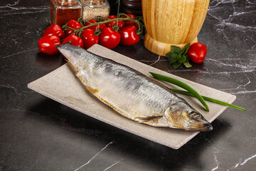 Whole raw salted herring fish