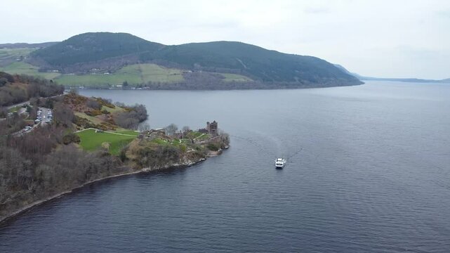 aerial footage of scenic Urquhart castle in loch ness