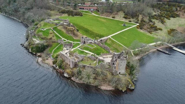 aerial footage of scenic Urquhart castle in loch ness